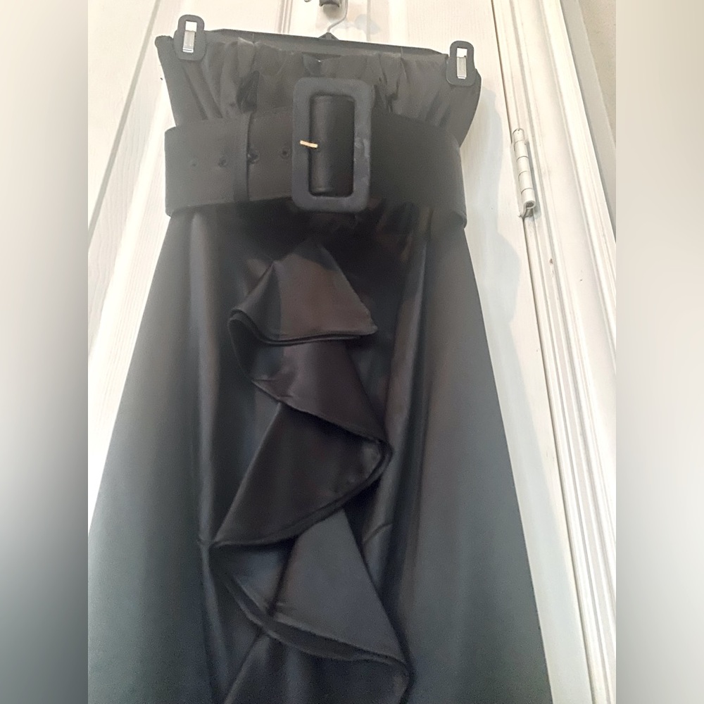 Black, strapless, dress, belted waist with ruffle.